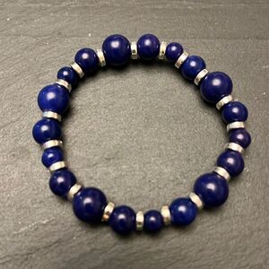 Handcrafted blue glass bead stretch bracelet w/silver tone spacer beads